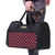 Sac de transport noir avec motif à carreaux rouges, poignées noires, marque 'Kumfiest' visible, animal à l'intérieur, côtés en maille pour aération.