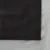 Černá tkanina s jemnou texturou, obdélníkový tvar na šedém pozadí.