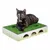 Cat toy made of cardboard with artificial grass and openings, a cat lying on it. Play and resting area for cats.