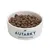 Bowl filled with Autarky complete dog food kibble, showing the product's appearance and branding.