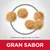 Croquetas redondas de pienso, tamaño aproximado 3,5 x 9 mm. Texto visible: GRAN SABOR.
