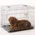 Wire pet crate with a brown animal lying inside, showing the size and use of the crate for secure containment.