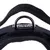 Close-up of a black dog harness with sturdy metal ring and durable nylon material.