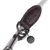 Close-up of a grey dog lead with brown leather trim, metal carabiner, and round tag engraved with logo 'N'.
