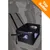 Seggiolino auto nero in tessuto con reti laterali, fissato al sedile anteriore tramite cinture. Angolo arancione in alto a destra con testo: Top Seller. Seggiolino auto nero in tessuto con reti laterali, fissato al sedile anteriore tramite cinture. Angolo arancione in alto a destra con testo: Top Seller.