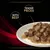 Lautasella naudanlihapaloja kastikkeessa. Kuvassa englanninkielinen teksti: WITH BEEF, TENDER PIECES.