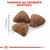 Tamanho do croquete adaptado. Três croquetes triangulares junto a escala desenhada de 1 cm.