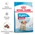 Royal Canin Puppy Medium 2–12 months. Sistema inmunitario fuerte, desarrollo cerebral, tamaño de la croqueta adaptado. Imagen del envase y croquetas redondas visibles.