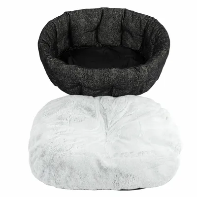 Letto per animali nero con bordo imbottito e cuscino in peluche bianco rimovibile.