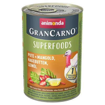 animonda GranCarno Superfoods purkki, näkyvissä teksti: Pute + Mangold, Hagebutten, Leinöl. Kuvassa kalkkuna, mangoldia, ruusunmarjoja ja öljyä. 1 tierisches protein.