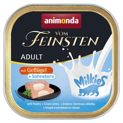 Animonda Vom Feinsten Adult med fjäderfä och gräddkärna. Serveringsförslag: köttbit med gräddfyllning på svart tallrik. Milkies-logotyp med mjölkstänk.