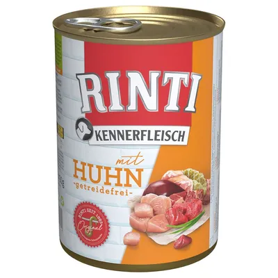 Scatola di alimento per cani Rinti Kennerfleisch mit Huhn getreidefrei, con immagini di carne e verdure sulla confezione. Testo visibile: Rinti, Kennerfleisch, mit Huhn, getreidefrei.