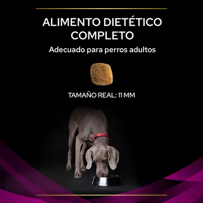 Alimento dietético completo, adecuado para perros adultos. Tamaño real de la croqueta: 11 mm. Imagen de un perro adulto comiendo en un cuenco metálico.