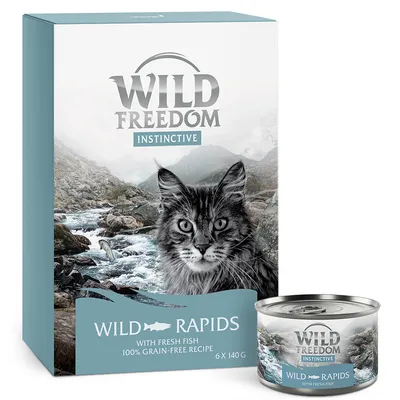 Boîte et boîte de conserve Wild Freedom Instinctive Wild Rapids, avec image de chat, mention 'with fresh fish', '100% grain-free recipe', 6 x 140 g visibles sur l'emballage.