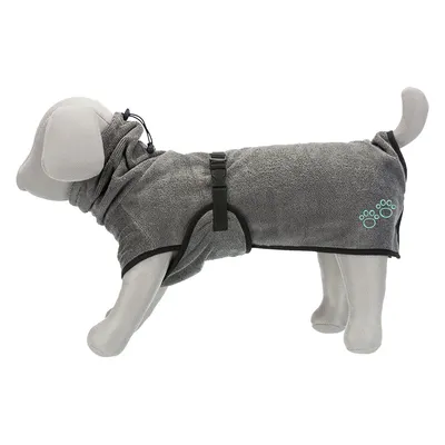 Manteau gris en tissu pour chien présenté sur un mannequin, fermeture par sangle noire et cordon au cou, motif pattes turquoise visible à l’arrière.