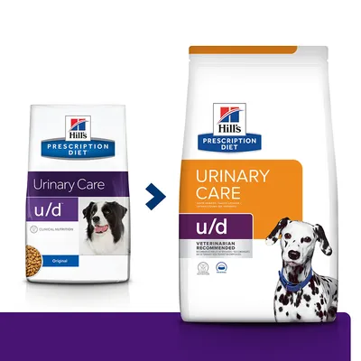 To poser Hill's Prescription Diet Urinary Care u/d hundefoder. Venstre pose med lilla felt og sort-hvid hund, højre pose med orange felt og dalmatiner. Synlig tekst: 'Veterinarian Recommended'.