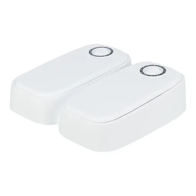 White feeder with two separate compartments and mechanical dials for time setting.