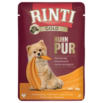 RINTI GOLD Huhn Pur, mini 100g, čisté kuře. Text: feinstückig, fettreduziert, leicht verträglich. Obraz psa s kusem masa v tlamě.