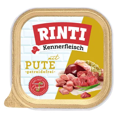 Rinti Kennerfleisch mit Pute, getreidefrei. Rinti seit 1983 Original. Abgebildet: Fleischstücke und Zutaten.