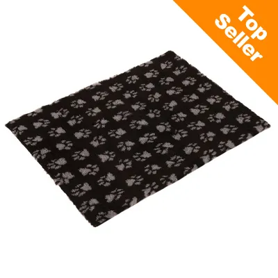 Svart matta med grå tassavtrycksmönster. Orange hörn med vit text: Top Seller.