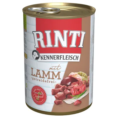 Rinti Kennerfleisch med lam, kornfri. Dåse viser kødstykker og ingredienser. Rinti siden 1983 Original.