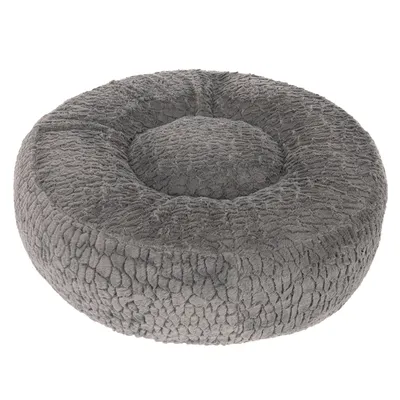 Rond, grijs knuffelbed met een zachte, gestructureerde oppervlakte.