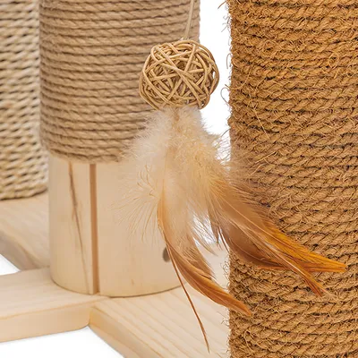 Cat tree with sisal-wrapped posts, wooden base and toy made of woven ball with feathers.