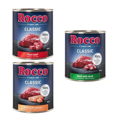 Trzy puszki Rocco Classic 800 g: Pure beef, Beef with duck, Beef with salmon. Widoczne napisy: 100% fresh ingredients, grain-free recipe.