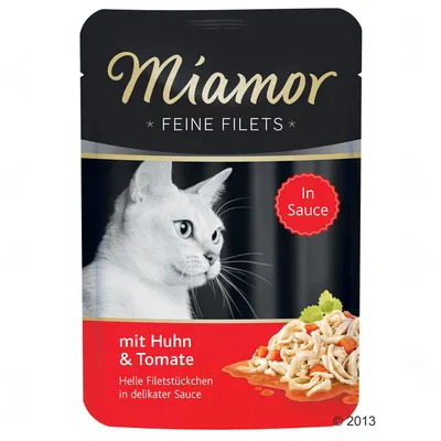 Miamor Feine Filets cat food pouch, mit Huhn & Tomate, In Sauce. Image shows a white cat and chicken with tomato pieces in sauce. Text in German.