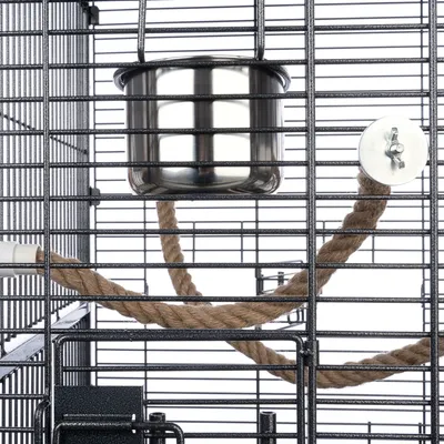 Metal cage with stainless steel bowl and attached natural fibre rope, suitable for small animals.
