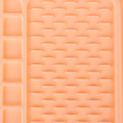 Silikonmatte mit rechteckigen und ovalen Vertiefungen, geeignet für die Verteilung von Futter oder Snacks.