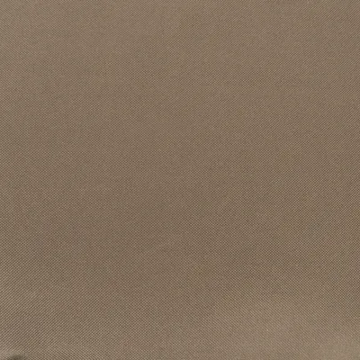Nahaufnahme eines braunen Stoffmaterials mit feiner Textur.