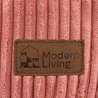 Modern Living λογότυπο σε ροζ ριγμένο ύφασμα.