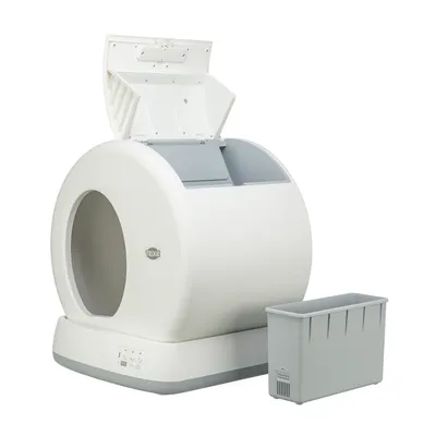 Trixie automatische Katzentoilette mit rundem Design, geöffnetem Deckel und separatem grauen Abfallbehälter.