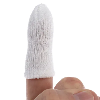 White fabric finger cot pulled over a human finger.