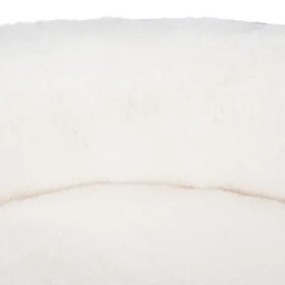 Close-up of white, soft plush material, suitable for pet products such as beds or blankets.