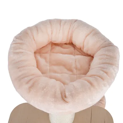 Round, padded cuddly bed in beige with soft plush cover and quilted interior.