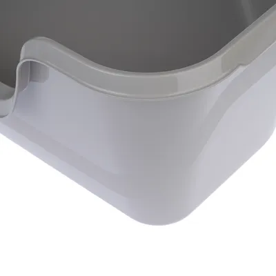 Close-up view of a grey plastic tray with rounded edges.