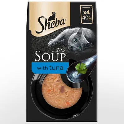 Sheba Soup with tuna, pack of 4 x 40g shown with soup contents and a spoon garnished with parsley.