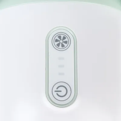 Control panel with fan symbol, three LED indicators and on/off symbol.