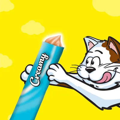 Illustration of a cartoon cat holding a blue tube labelled 'Creamy' with creamy treat being squeezed out, suggesting the product is a squeezable pet treat.