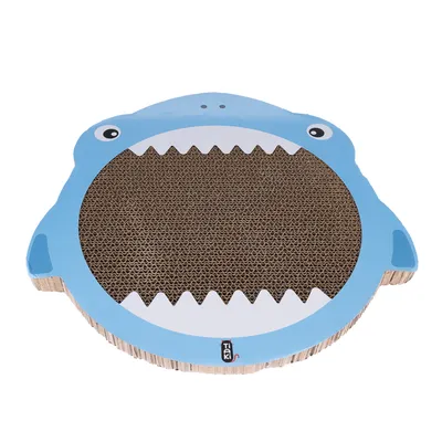 Griffoir en carton en forme de tête de requin bleu avec surface centrale en carton ondulé, marque TIAKI visible sur le devant.