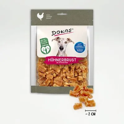 Zak Dokas Hühnerbrust in Stöckchen, stukjes kipfilet van ca. 2 cm zichtbaar, met afbeelding hond en tekst: Animal Durable Stickers, Sliced Chicken Breast.