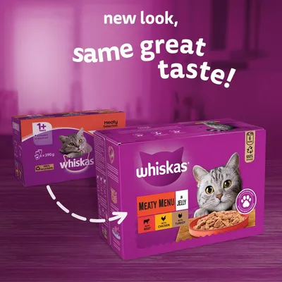 Confezioni di cibo per gatti Whiskas Meaty Menu in Jelly, visibili varianti manzo, pollo e tacchino. Testo in inglese: 'new look, same great taste!'. Immagine di gatto sulla scatola.