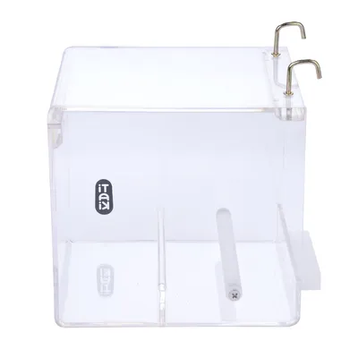 Transparent acrylic box with two metal hooks and a white rod, suitable for mounting or storage. Visible logo: Ista.