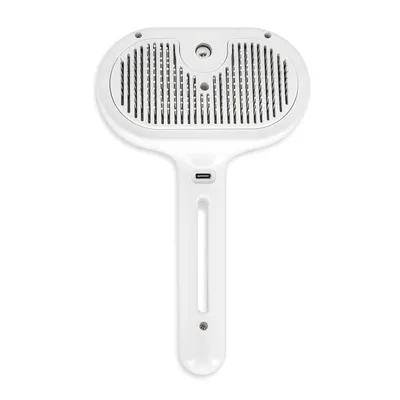 White brush with ventilation slots and USB-C port, suitable for grooming animal fur.