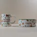 TIAKI Set aus Tasse & Napf "Funny Winter Dogs"