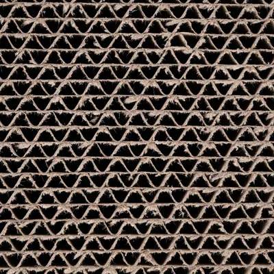 Nærbillede af bølgepap med bølgestruktur, egnet til kradseflader eller emballagemateriale.