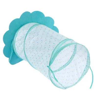 Fabric play tunnel with blue edge and polka dot pattern, flower-shaped opening at one end.
