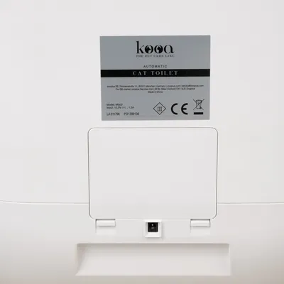 kooa Automatic Cat Toilet, model M500, input: 12V, 1.5A, CE marking, made in China.